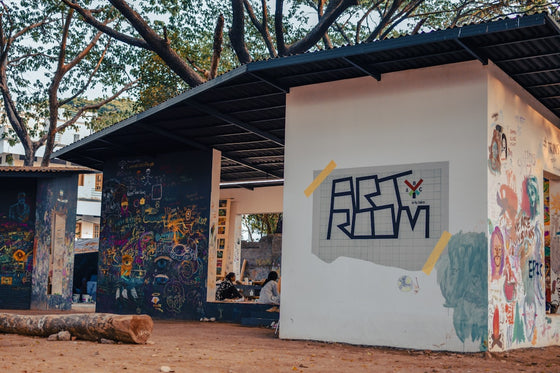 a white building with graffiti on the side of it
