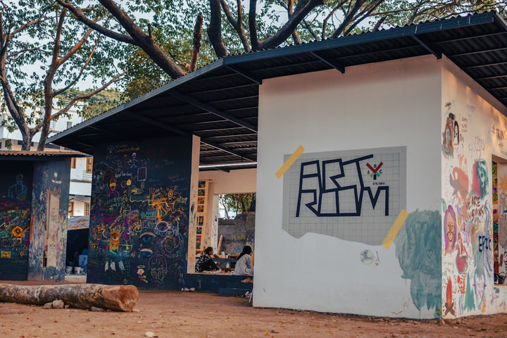 a white building with graffiti on the side of it