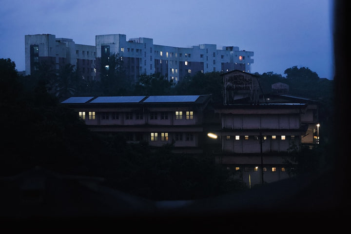 A view of a city at night from a window