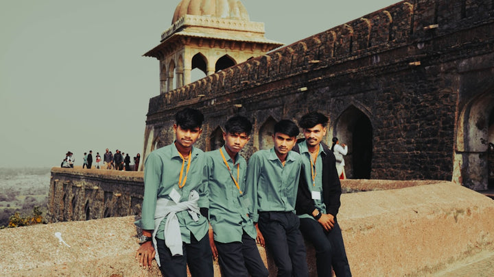 A group of young men standing next to each other